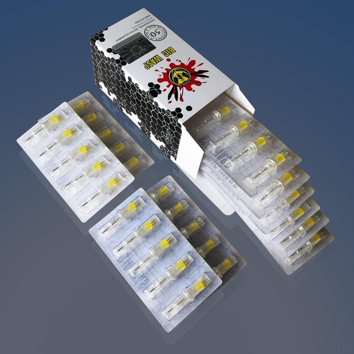 BIGWASP cartridges on studio bench during tattoo work showing organized workflow benefit