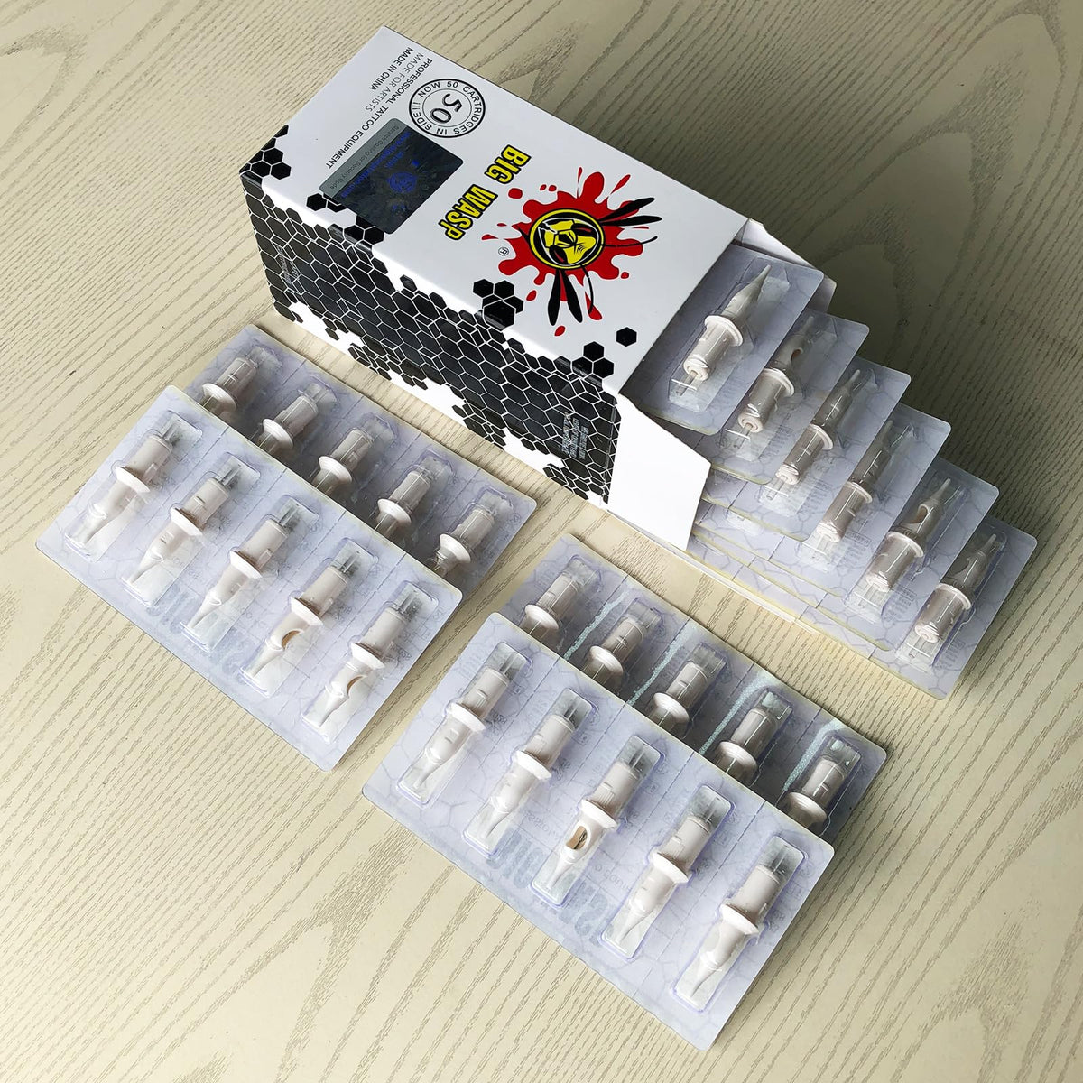 BIGWASP cartridges on a clean studio tray illustrating ready-to-use convenience
