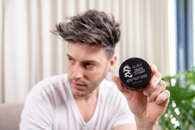Billy Jealousy styled dry hair with windswept matte texture and volume
