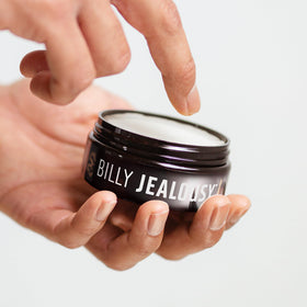 Billy Jealousy label close-up listing key ingredients and easy-rinse water-based benefit