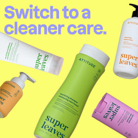 ATTITUDE 16 fl oz bottle next to hand to show true product scale