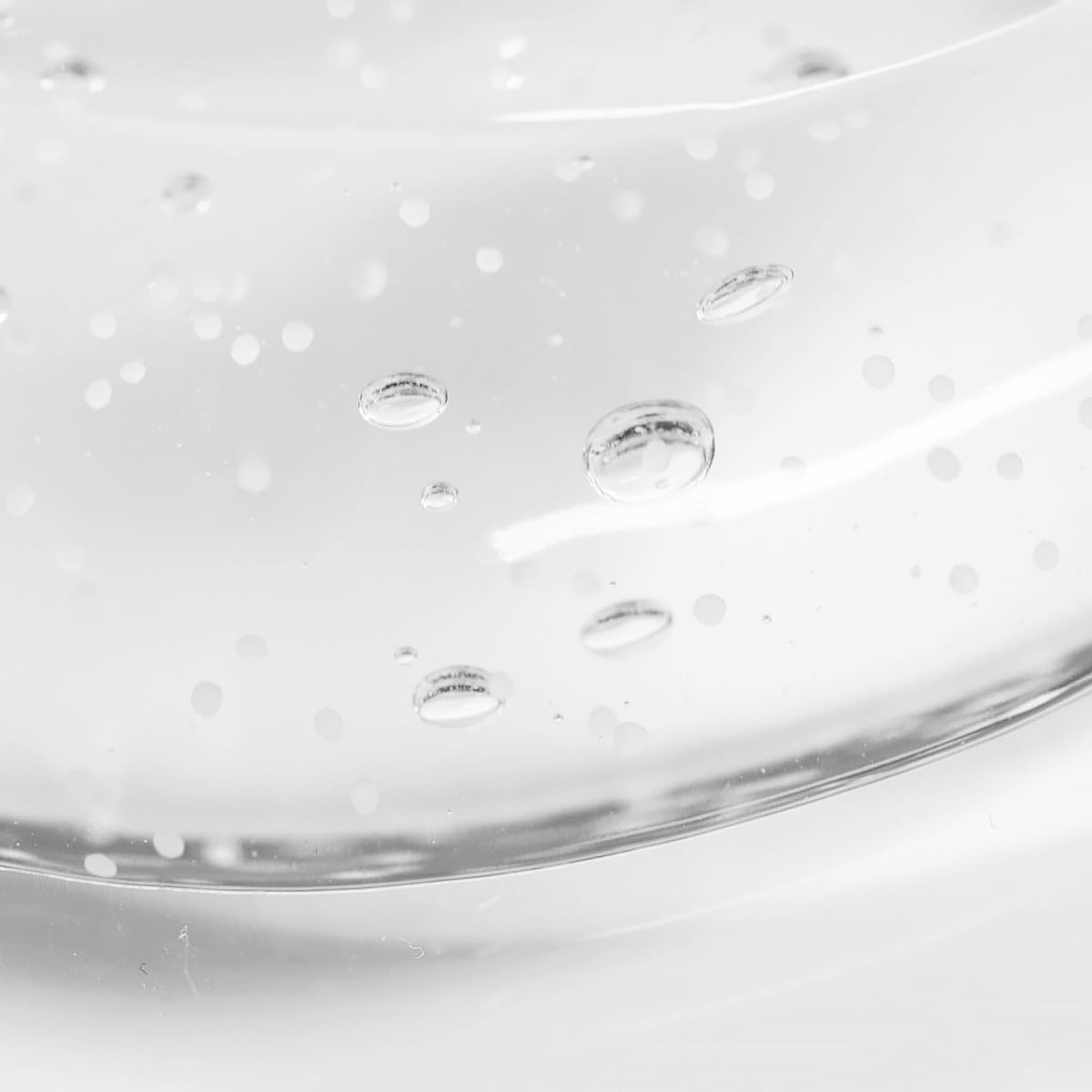 Bioderma Atoderm held in hand illustrating bottle scale and portability