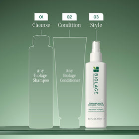 Biolage Finishing Spritz next to a hand for size comparison and ease of use
