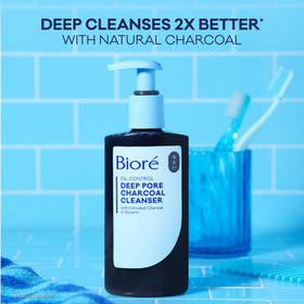 Bioré size comparison in hand, showing 6.77 oz bottle and travel-friendly benefit