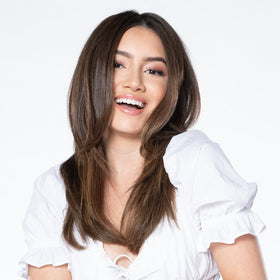 Applying BioSilk conditioner to damp hair for easier detangling