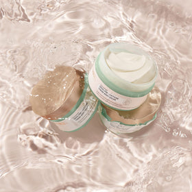 BIOSSANCE jar beside hand showing 6.7 fl oz scale and travel-friendly benefit