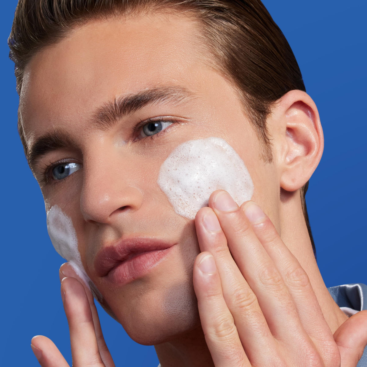 Biotherm product in hand for scale and easy daily use benefit