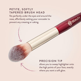 BK BEAUTY brush applying subtle highlight to cheekbone for natural glow