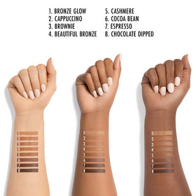 Black Radiance soft brush applicator close-up demonstrating smooth blending capability