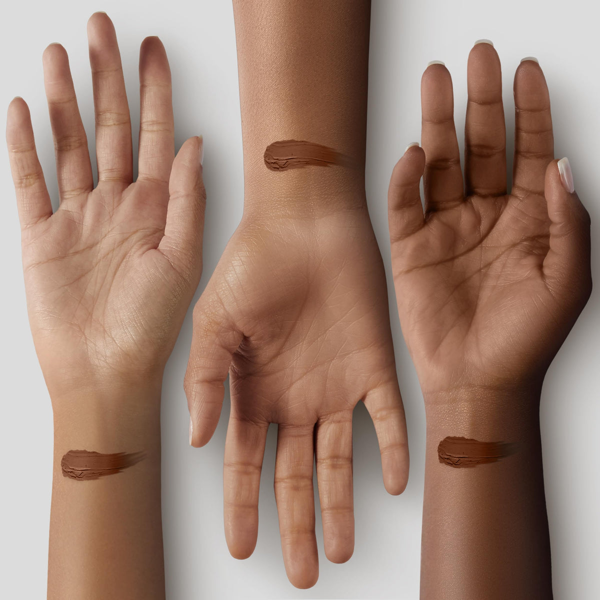 Black Radiance texture swipe on arm swatch showing buildable, pigment-rich coverage
