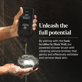 Black Wolf bottle next to hand for 10 fl oz size and travel-friendly scale