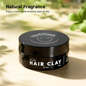 BlackMask hands applying clay to hair demonstrating quick styling and volume benefits