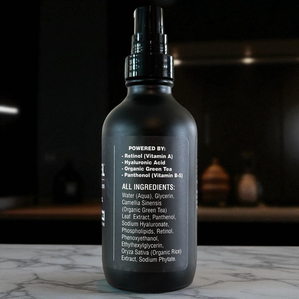BLACKSTEEL matte glass close-up emphasizing durable bottle and light-blocking protection benefit
