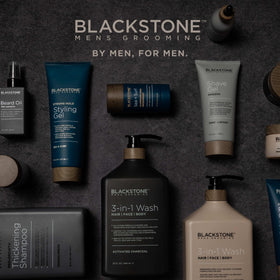 Blackstone 6 fl oz size in hand for scale showing compact grooming solution for daily use