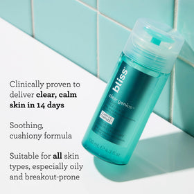 Bliss bottle label close-up listing salicylic acid niacinamide and witch hazel benefits