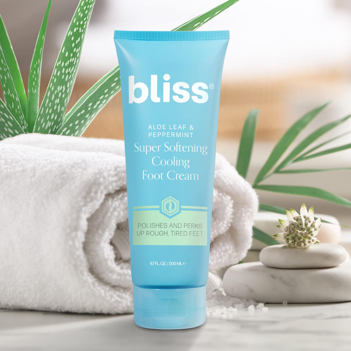 Bliss foot cream tube staged in a bathroom setting showing spa-like freshness for tired feet