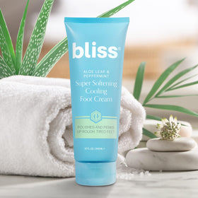 Bliss foot cream tube staged in a bathroom setting showing spa-like freshness for tired feet