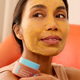 Bliss rinsing mask under water to show removal and gentle exfoliation