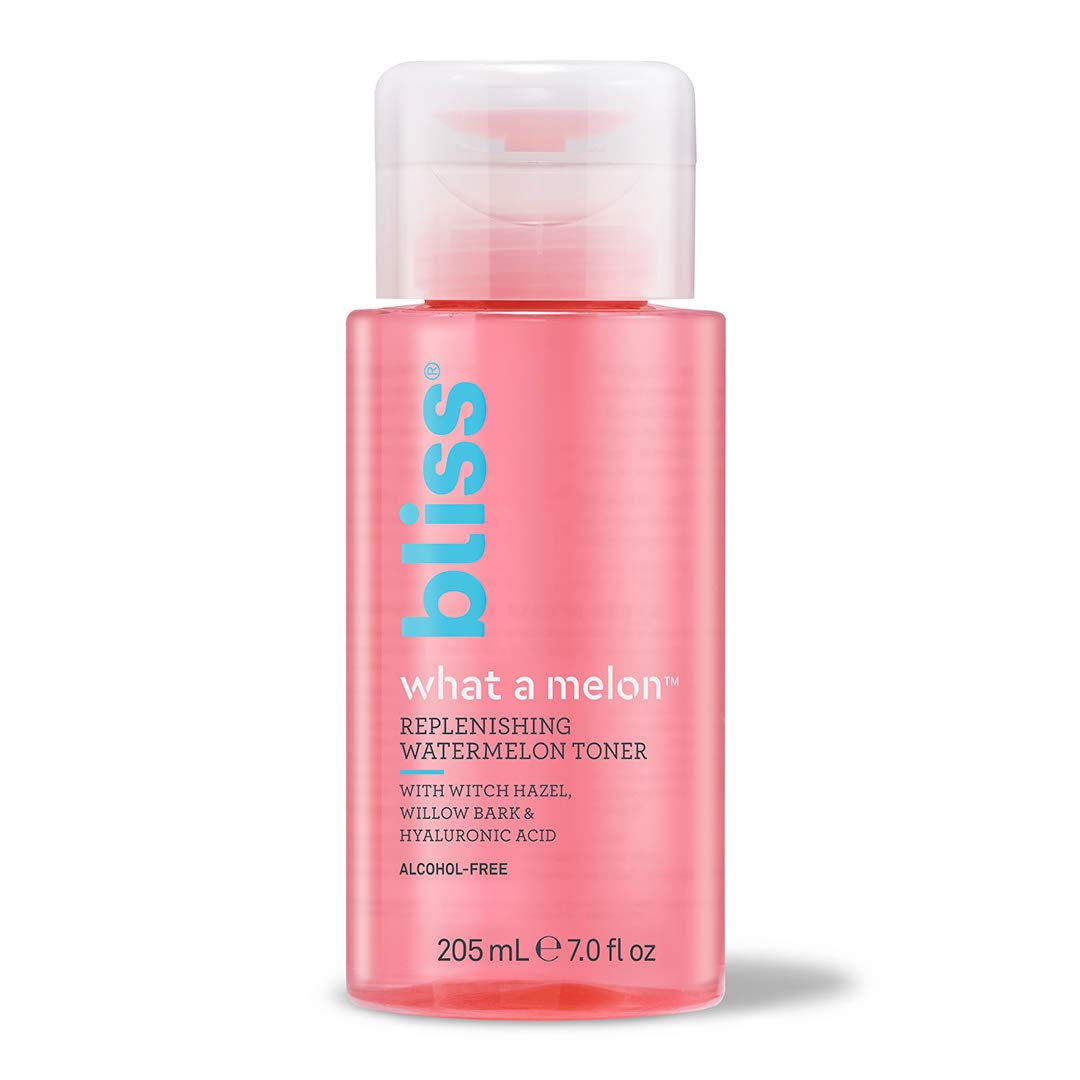Bliss bottle next to measuring scale showing 7 fl oz travel-friendly size