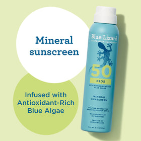 Applying Blue Lizard spray on arm then rubbing in for even child protection