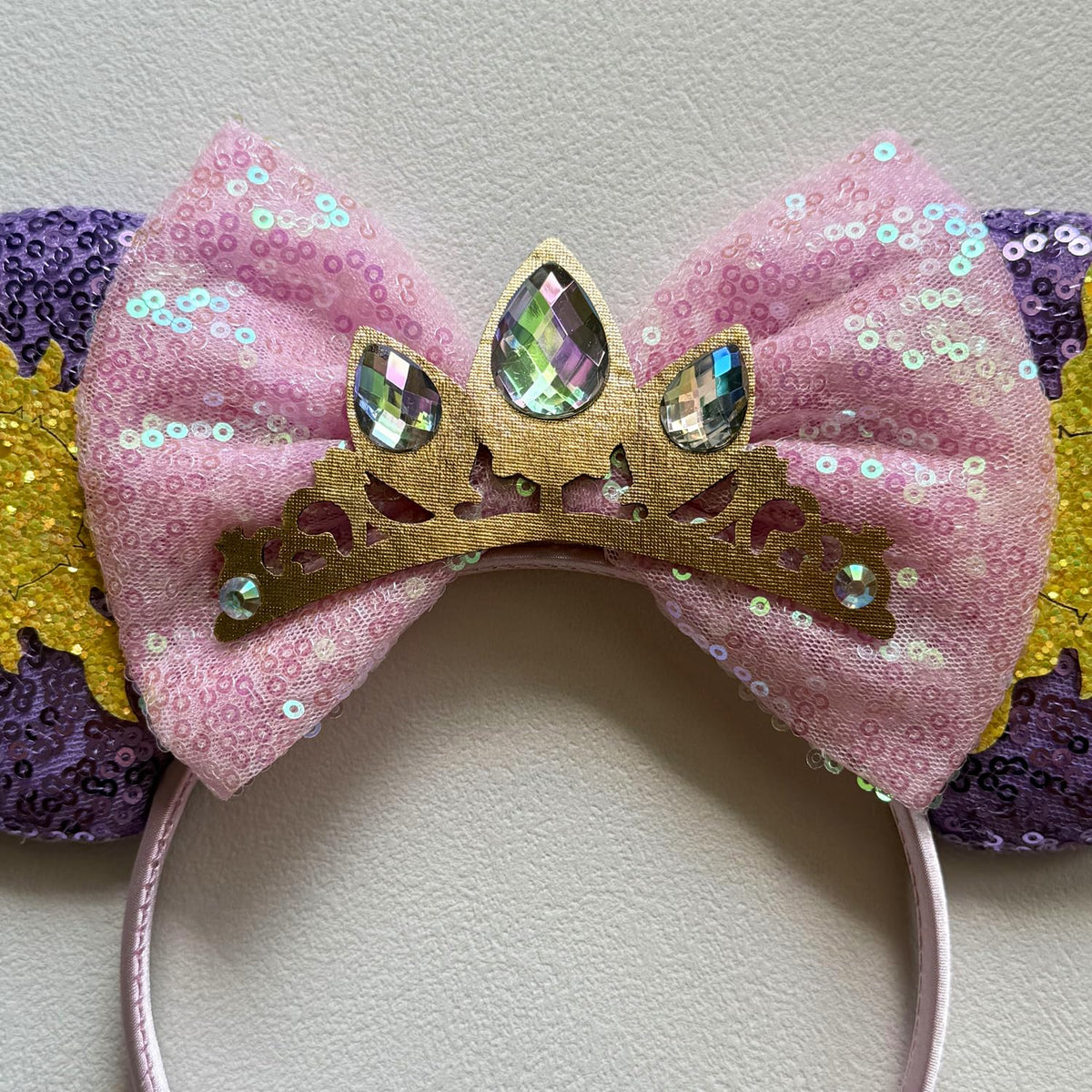 Bmobuo headband worn at theme park in use adds festive look and photo-ready charm benefit