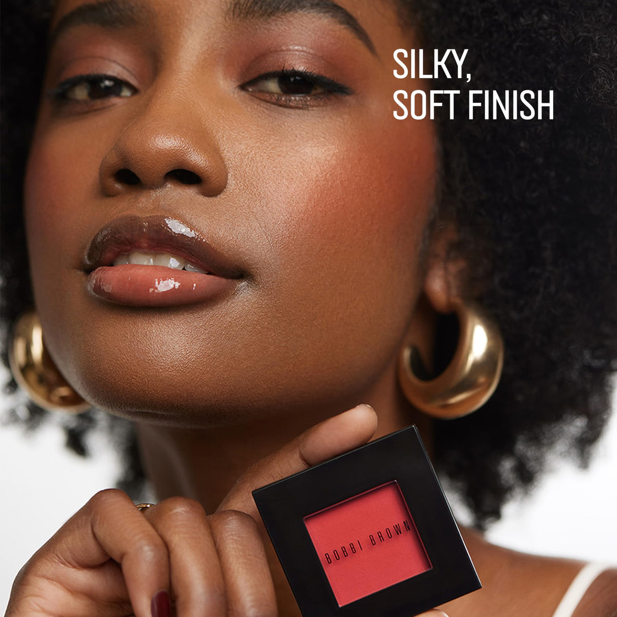 Bobbi Brown swatch on skin showing buildable color payoff benefit