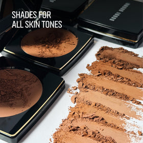 Bobbi Brown bronzer held in hand to show compact size and travel-friendly benefit