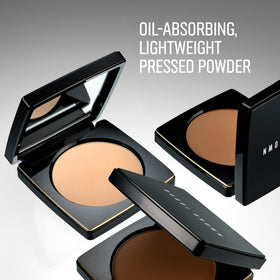 Bobbi Brown compact open with included puff demonstrating convenient on-the-go touch-up readiness