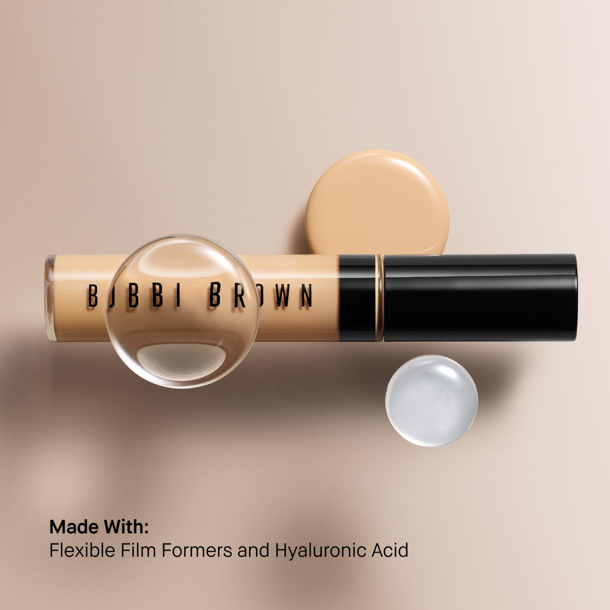 Bobbi Brown concealer held in hand for size comparison showing portable 0.27 fl oz convenience