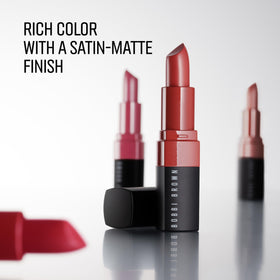 Bobbi Brown applied on lips close-up showing satin-matte finish and natural look benefit