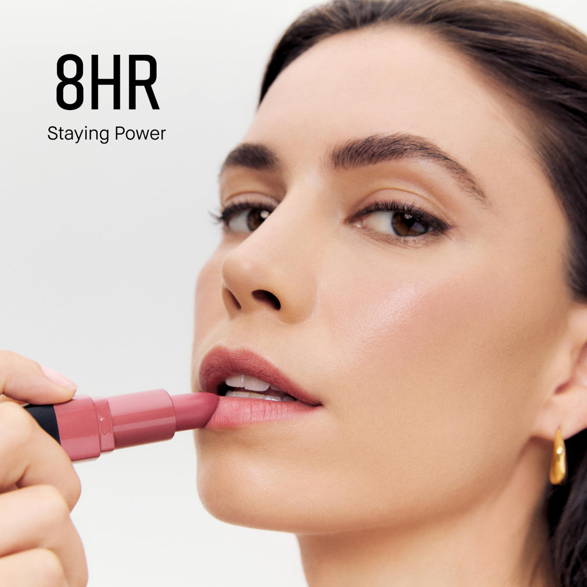 Bobbi Brown swatch on arm showing buildable cranberry color payoff benefit