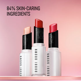 bobbi brown balm held in hand for scale, showing compact size and travel-friendly benefit