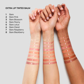 bobbi brown lifestyle image of model smiling wearing balm, showing natural healthy glow
