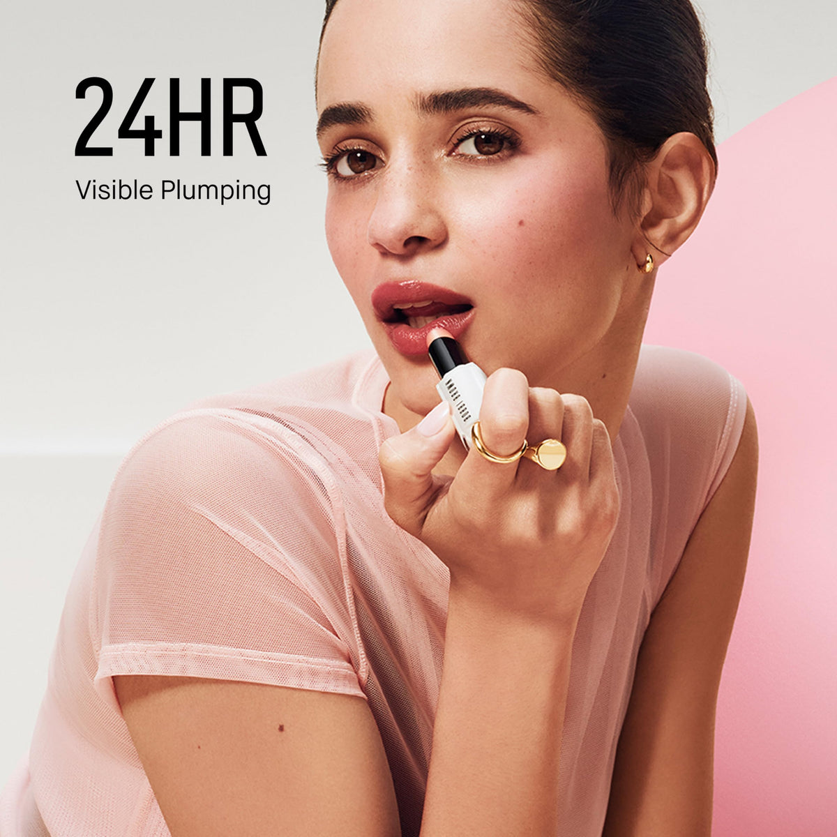 bobbi brown swatch of Bare Raspberry on skin, showing sheer color and hydrated finish