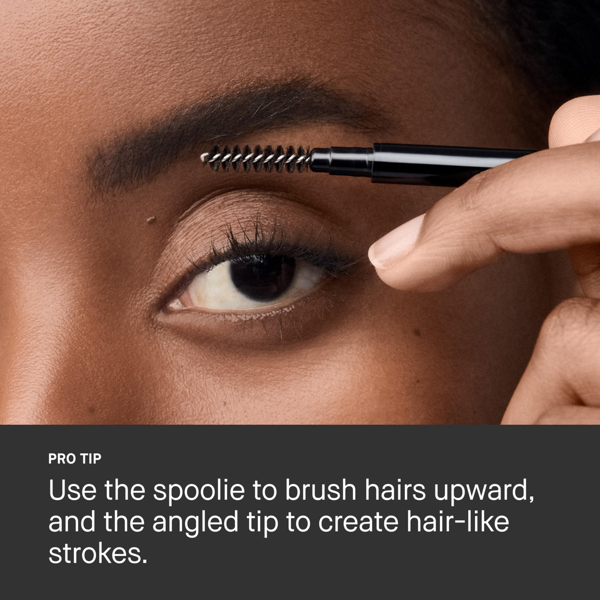Bobbi Brown Precise Brow Pencil applied on model brows for natural finish