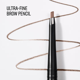 Bobbi Brown pencil beside coin showing size and travel-friendly benefit