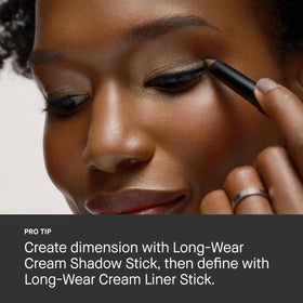 Bobbi Brown liner next to travel items showing compact, on-the-go convenience