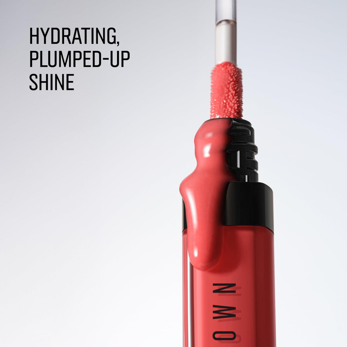 Bobbi Brown texture close-up showing oil-infused gloss slip and shine