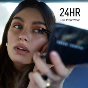 Bobbi Brown stick being applied to eyelid showing smooth coverage and long-lasting color