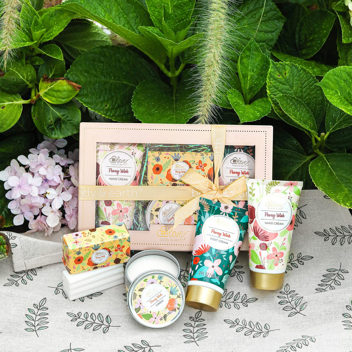 BODY & EARTH # LOVE applying hand cream to hands demonstrating fast absorption and softness