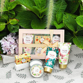 BODY & EARTH # LOVE applying hand cream to hands demonstrating fast absorption and softness