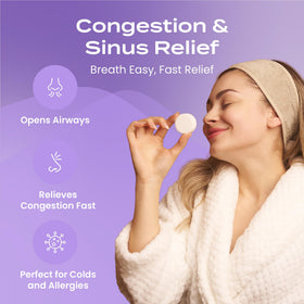 Body Restore lavender oil bottle beside tablet illustrating premium ingredients and fragrance