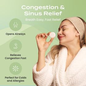 Body Restore tablet in shower water releasing steam for an invigorating scent