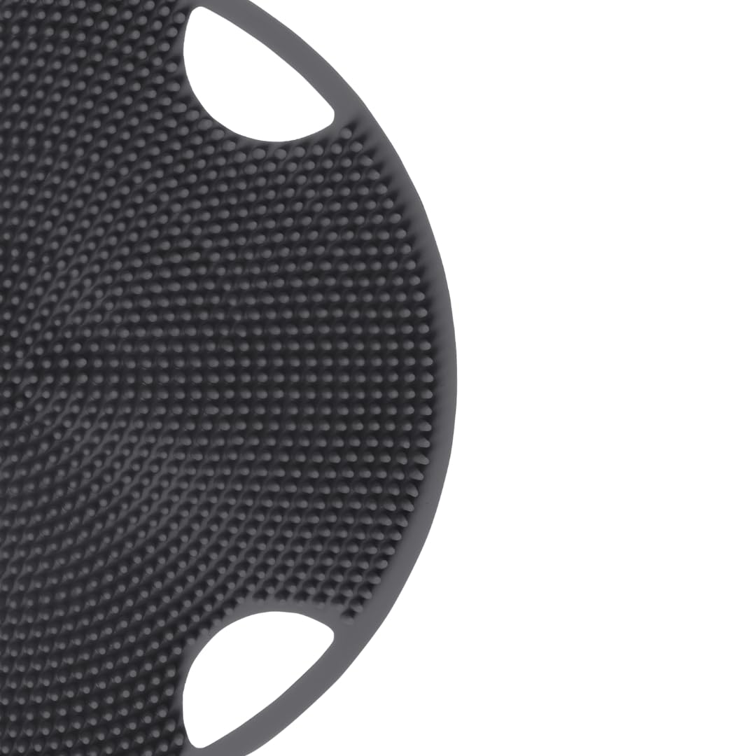 Boie USA scrubber in shower held by hand demonstrating secure grip and fast drying