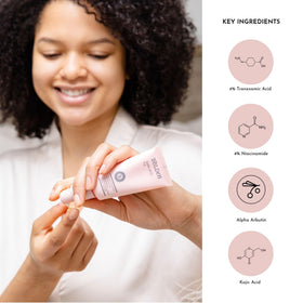 BOLDEN hand applying serum to show drop size and true product scale benefit
