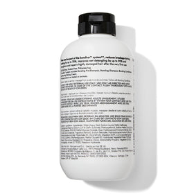 Bondbar bottle held in hand showing 8 fl oz size and travel benefit