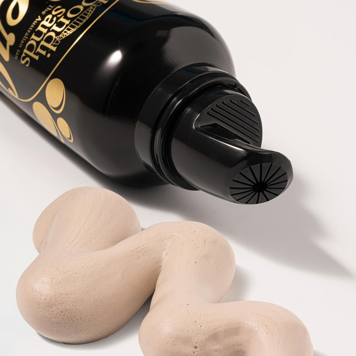 Lifestyle bathroom display with Bondi Sands showing easy at-home tanning