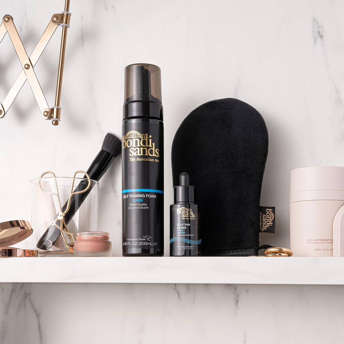 bondi sands mixing drops into moisturizer for even application