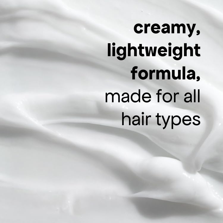 BONDIBOOST conditioner in hand, illustrates smooth feel and detangling benefit
