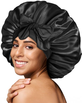 BONNET QUEEN front view of oversized black satin bonnet shows roomy fit and protective design